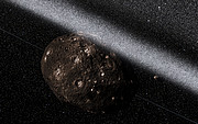 Představa prstenců kolem planetky Chariklo (pohled z vnitřní části prstenců)